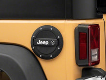 Load image into Gallery viewer, Officially Licensed Jeep 07-18 Jeep Wrangler JK Locking Fuel Door w/ Printed Jeep Logo