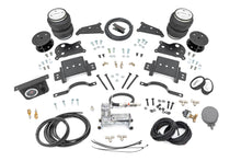 Load image into Gallery viewer, Air Spring Spacer Kit w/ Compressor 5 Inch Lift Ram 2500 4WD (2014-2026) Rough Country