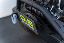 Cargar imagen en el visor de la galería, DV8 Offroad Fairlead Mounted Flip-Up License Plate Bracket