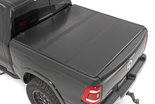 Load image into Gallery viewer, Hard Folding Bed Cover 5.5 Ft Bed Ram 1500 2WD/4WD (10-23 and Classic) Rough Country