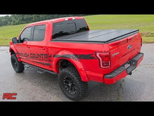 Load image into Gallery viewer, Hard Folding Bed Cover 5.5 Ft Bed Ram 1500 2WD/4WD (10-23 and Classic) Rough Country
