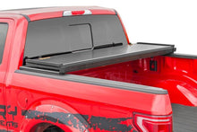 Load image into Gallery viewer, Hard Folding Bed Cover 5.5 Ft Bed Ram 1500 2WD/4WD (10-23 and Classic) Rough Country
