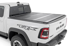 Load image into Gallery viewer, Hard Low Profile Bed Cover 5 Foot 7 Inch Bed No Rambox Ram 1500 (19-26)/1500 TRX (21-24) Rough Country