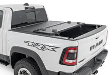 Load image into Gallery viewer, Hard Low Profile Bed Cover 5 Foot 7 Inch Bed No Rambox Ram 1500 (19-26)/1500 TRX (21-24) Rough Country