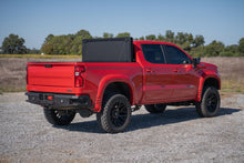 Load image into Gallery viewer, Hard Tri-Fold Flip Up Bed Cover 5 Foot 10 Inch Bed Chevy/GMC Sierra 1500 (19-26)/Silverado 1500 (19-26) Rough Country
