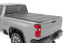 Load image into Gallery viewer, Hard Tri-Fold Flip Up Bed Cover 6 Foot 9 Inch Bed Chevy/GMC Silverado/Sierra 2500HD/3500HD (20-26) Rough Country