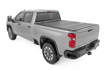 Load image into Gallery viewer, Hard Tri-Fold Flip Up Bed Cover 6 Foot 9 Inch Bed Chevy/GMC Silverado/Sierra 2500HD/3500HD (20-26) Rough Country