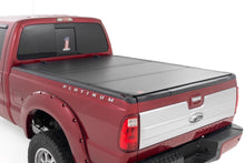Load image into Gallery viewer, Hard Tri-Fold Flip Up Bed Cover 6 Foot 10 Inch Bed Ford F-250/F-350 Super Duty (99-16) Rough Country