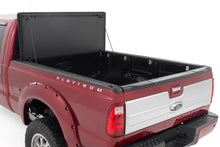 Load image into Gallery viewer, Hard Tri-Fold Flip Up Bed Cover 6 Foot 10 Inch Bed Ford F-250/F-350 Super Duty (99-16) Rough Country