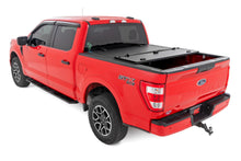 Load image into Gallery viewer, Hard Tri-Fold Flip Up Bed Cover 5 Foot 7 Inch Bed Ford F-150 2WD/4WD (2015-2020) Rough Country