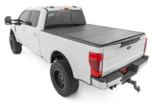 Load image into Gallery viewer, Hard Tri-Fold Flip Up Bed Cover 6 Foot 10 Inch Bed Ford F-250/F-350 Super Duty (17-26) Rough Country