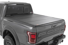 Load image into Gallery viewer, Hard Tri-Fold Flip Up Bed Cover 5 Foot 7 Inch Bed Ford F-150 (21-26)/F-150 Lightning (22-26) Rough Country