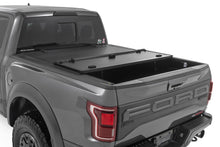 Load image into Gallery viewer, Hard Tri-Fold Flip Up Bed Cover 5 Foot 7 Inch Bed Ford F-150 (21-26)/F-150 Lightning (22-26) Rough Country