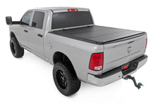 Load image into Gallery viewer, Hard Tri-Fold Flip Up Bed Cover 6 Foot 4 Inch Bed Ram 1500/2500/3500 (10-25 &amp; Classic) Rough Country