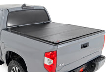 Load image into Gallery viewer, Hard Tri-Fold Flip Up Bed Cover 5 Foot 7 Inch Bed Toyota Tundra 2WD/4WD (07-21) Rough Country
