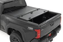 Load image into Gallery viewer, Hard Tri-Fold Flip Up Bed Cover 6 Foot Bed Toyota Tacoma 2WD/4WD (2024-2026) Rough Country