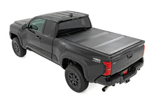 Load image into Gallery viewer, Hard Tri-Fold Flip Up Bed Cover 6 Foot Bed Toyota Tacoma 2WD/4WD (2024-2026) Rough Country