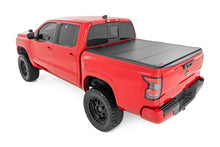 Load image into Gallery viewer, Hard Tri-Fold Flip Up Bed Cover 5 Foot Bed Nissan Frontier 2WD/4WD (22-26) Rough Country