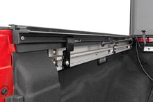 Load image into Gallery viewer, Hard Tri-Fold Flip Up Bed Cover 5 Foot Bed Nissan Frontier 2WD/4WD (22-26) Rough Country