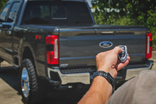 Load image into Gallery viewer, Powered Retractable Bed Cover 6 Foot 10 Inch Bed Ford F-250/F-350 Super Duty (17-26) Rough Country