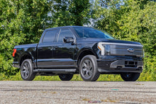 Load image into Gallery viewer, 3/4 Inch Front Leveling Kit Lowers Rear 1.5 Inches Ford F-150 Lightning (22-26) Rough Country