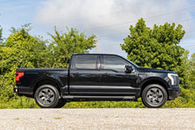 Load image into Gallery viewer, 3/4 Inch Front Leveling Kit Lowers Rear 1.5 Inches Ford F-150 Lightning (22-26) Rough Country