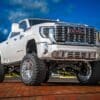 Load image into Gallery viewer, McGaughy's 7-9 Inch Premium Lift Kit with M84 RR Shocks 2020-2026 Silverado/Sierra 3500 2WD/4WD