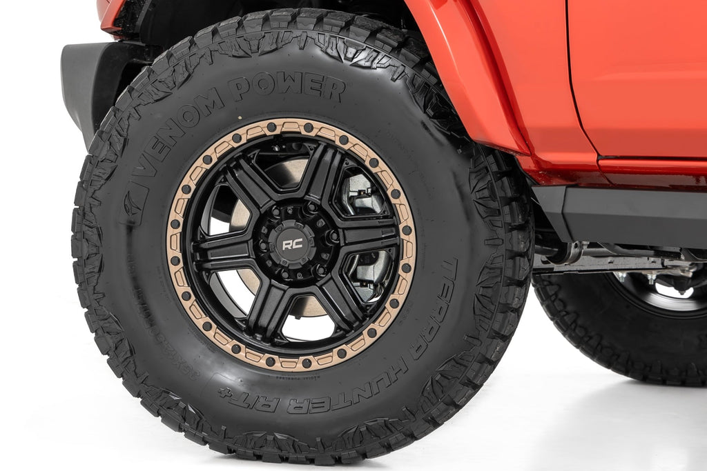 79 Series Wheel One-Piece Semi Gloss Black w/Bronze Ring 17x8.5 5x5 0mm Rough Country