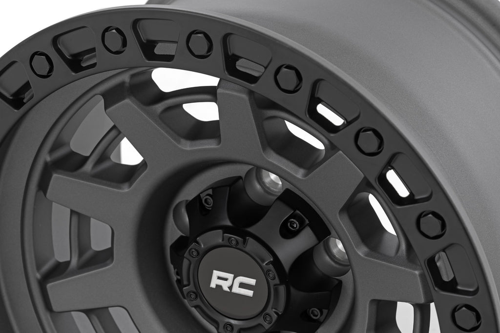 85 Series Wheel One-Piece Gunmetal Gray/Black 15x8 5x4.5 -19mm Rough Country