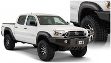 Load image into Gallery viewer, Husky Liners Fleetside Pocket Style Fender Flares 4pc 73.5in Bed - Black | 2012 - 2015 Toyota Tacoma