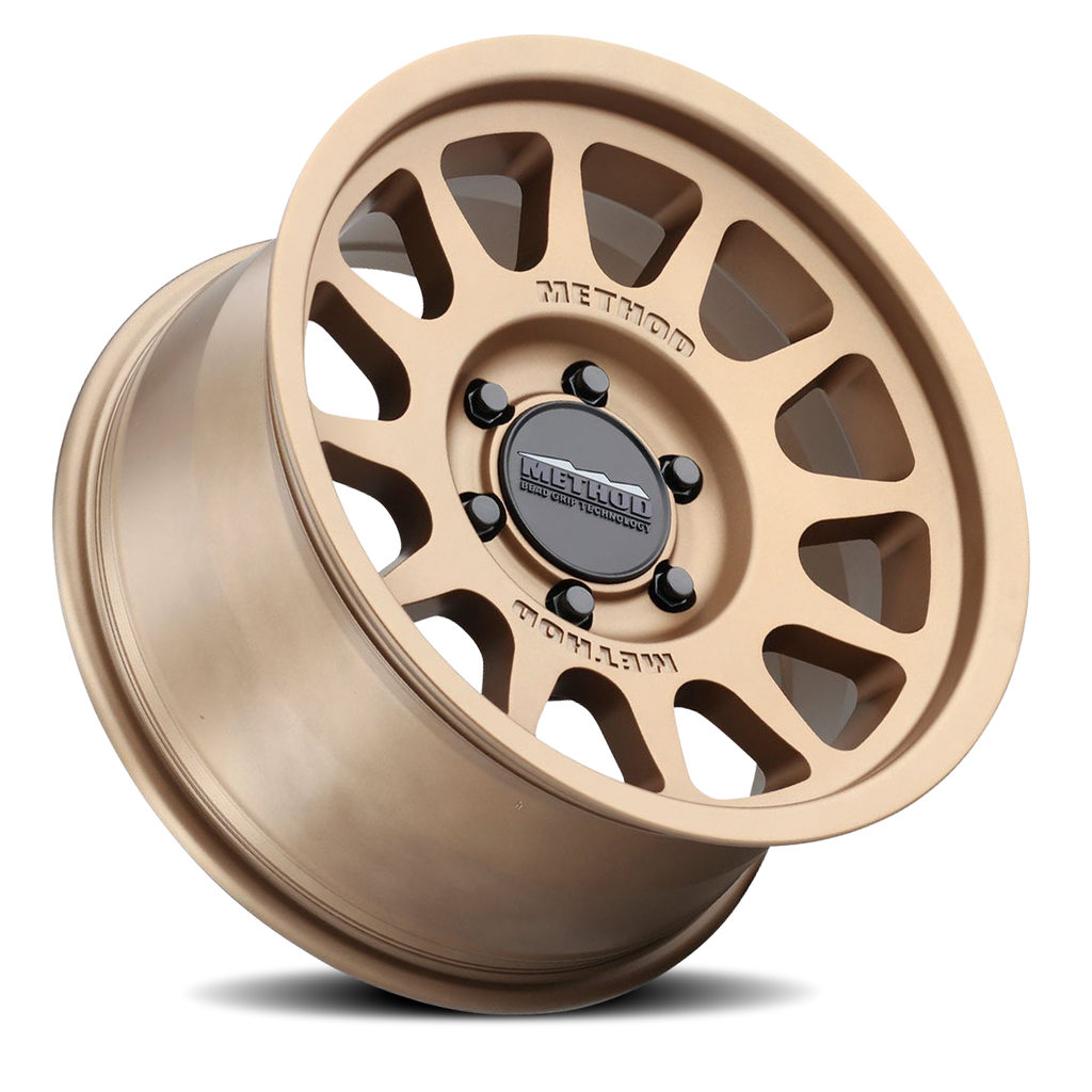 Aluminum Wheels 17x8.5 Bead Grip MR703 Bolt Pattern 6 On 139.7 Offset 0 Lip Size 1.18 Method Bronze BRZ Method
