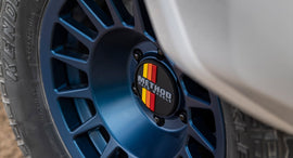 Method Wheels Push Through Center Cap | 108mm | Black with Yellow / Orange / Red Stripes