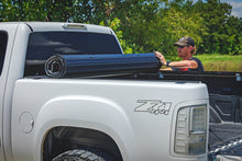 Load image into Gallery viewer, Rough Country Hard Roll Up Bed Cover | 2007 - 2013 Chevy Silverado / GMC Sierra 1500 5'9" Bed Length