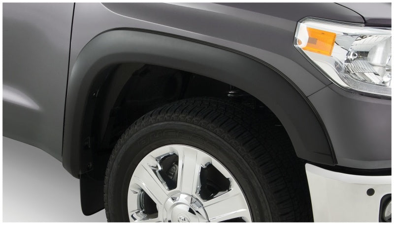Bushwacker 07-13 Toyota Tundra Fleetside OE Style Flares 4 piezas con guardabarros de fábrica - Negro