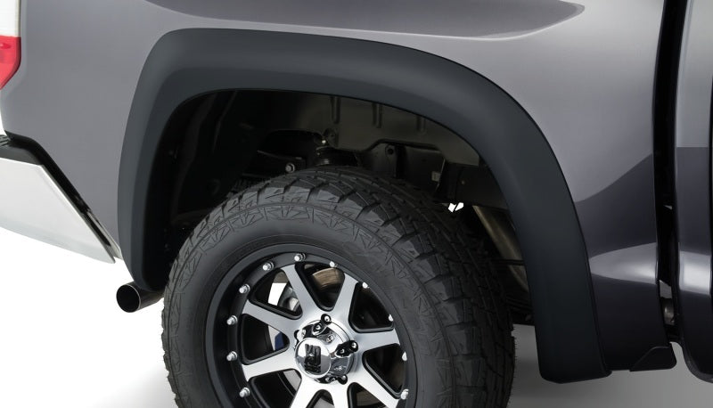 Bushwacker 14-18 Toyota Tundra Fleetside Extend-A-Fender estilo bengalas 4 piezas - negro