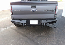 Cargar imagen en el visor de la galería, Addictive Desert Designs 10-14 Ford F-150 Raptor HoneyBadger Rear Bumper w/ Tow Hooks