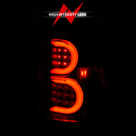ANZO 2002-2009 Chevrolet Trailblazer luces traseras LED con barra de luz, carcasa negra, lente transparente