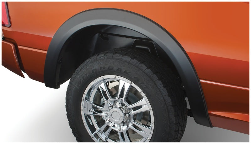 Bushwacker 09-18 Dodge Ram 1500 Fleetside OE Style Flares 4 piezas 67.4/76.3/96.3 pulgadas cama - Negro