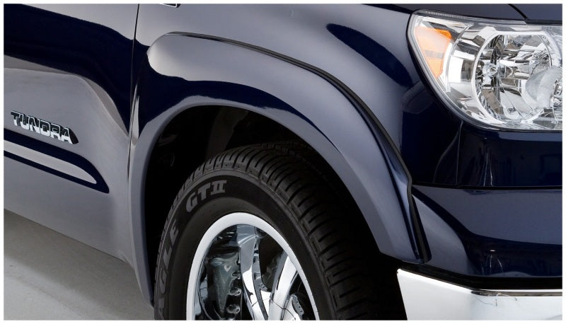 Bushwacker 07-13 Toyota Tundra Fleetside OE Style Flares 4 piezas con guardabarros de fábrica - Negro