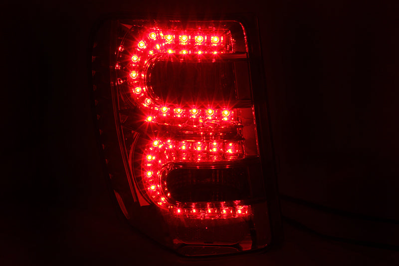 ANZO 1999-2004 Jeep Grand Cherokee luces traseras LED rojo/ahumado