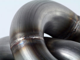 Cabezal de acero trenzado aFe SS-409 HDR Nissan Frontier/Xterra 05-09 V6-4.0L