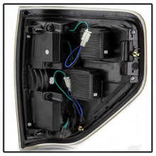 Cargar imagen en el visor de la galería, xTune 09-14 Ford F-150 Light Bar LED Tail Lights - Black (ALT-JH-FF15009-LBLED-BK)