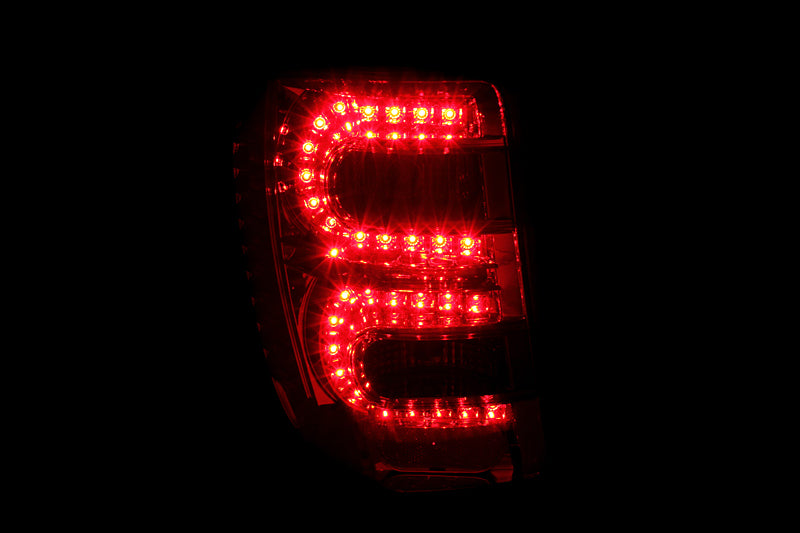 ANZO 1999-2004 Jeep Grand Cherokee luces traseras LED rojo/transparente