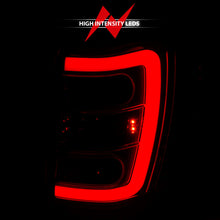 Cargar imagen en el visor de la galería, ANZO 1999-2004 Jeep Grand Cherokee luces traseras LED con barra de luz, carcasa cromada, lente roja/transparente