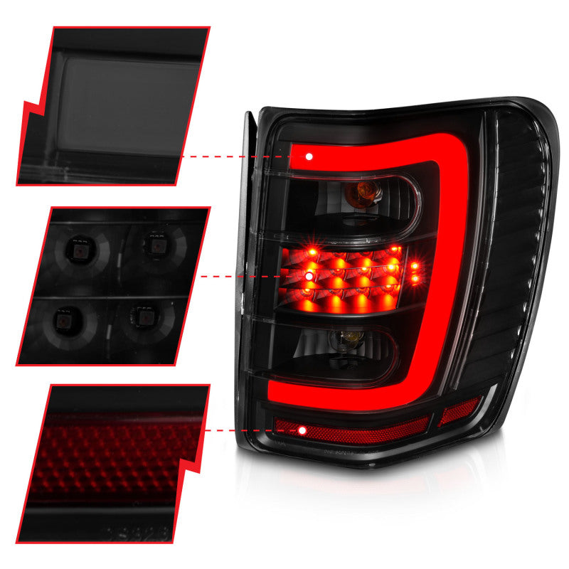 ANZO 1999-2004 Jeep Grand Cherokee luces traseras LED con barra de luz, carcasa negra, lente ahumada