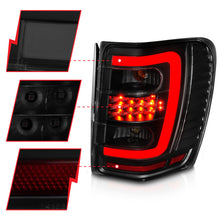 Cargar imagen en el visor de la galería, ANZO 1999-2004 Jeep Grand Cherokee luces traseras LED con barra de luz, carcasa negra, lente ahumada