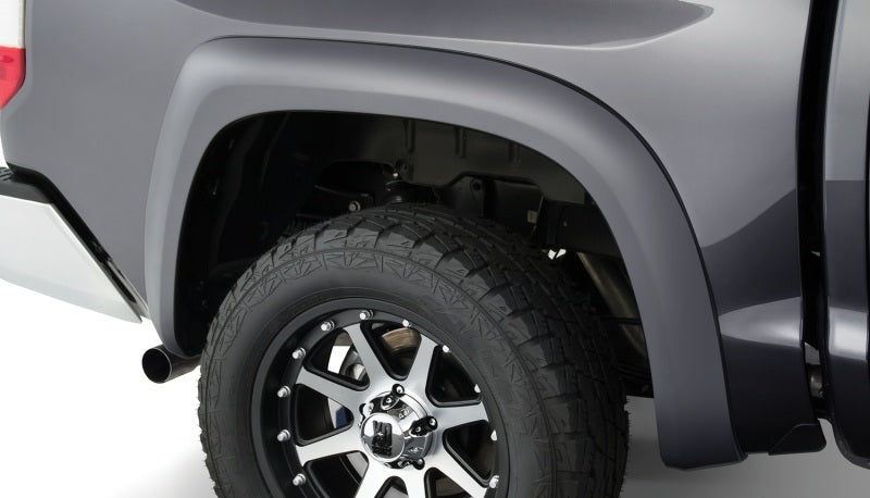 Bushwacker 14-18 Toyota Tundra Fleetside Extend-A-Fender estilo bengalas 4 piezas - negro