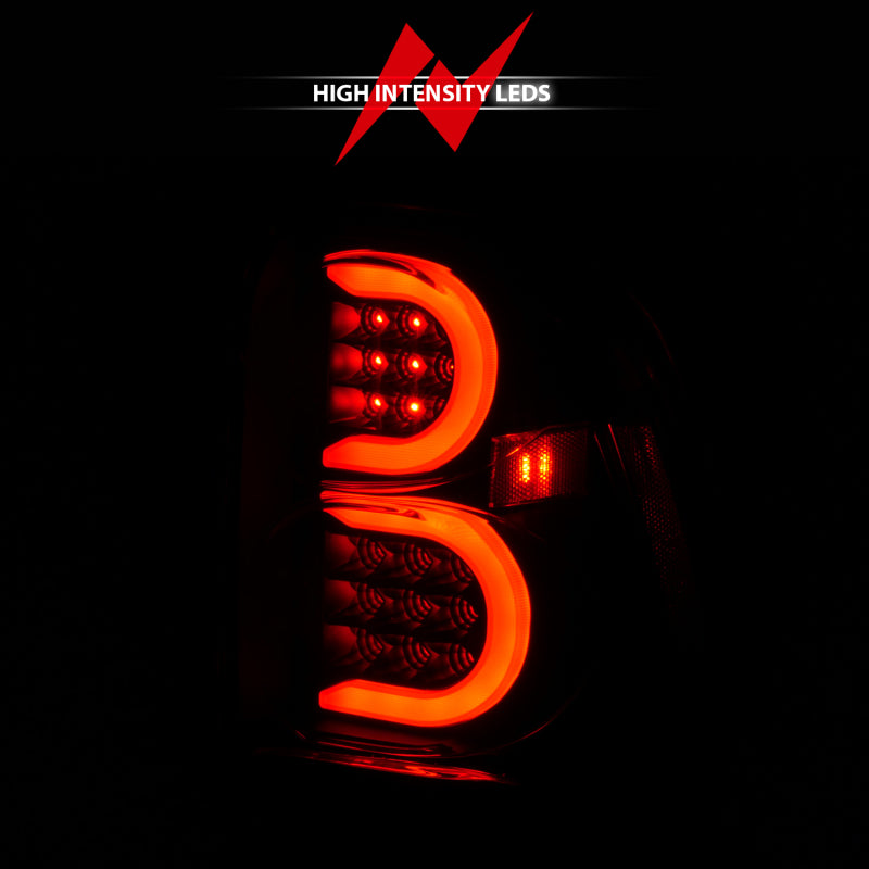 ANZO 2002-2009 Chevrolet Trailblazer luces traseras LED con barra de luz, carcasa negra, lente ahumada
