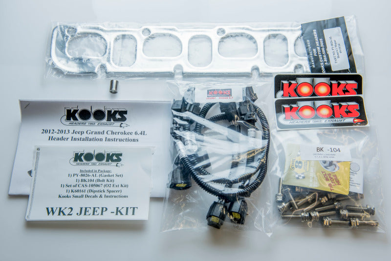 Kooks 12+ Jeep Grand Cherokee 6.4L 1-7/8 pulgadas x 3 pulgadas SS cabezales de tubo largo con tubos de conexión con gato verde