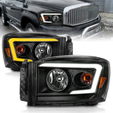 Anzo 06-09 Dodge RAM 1500/2500/3500 Faros delanteros carcasa negra/lente transparente (con barras de luz de conmutación)